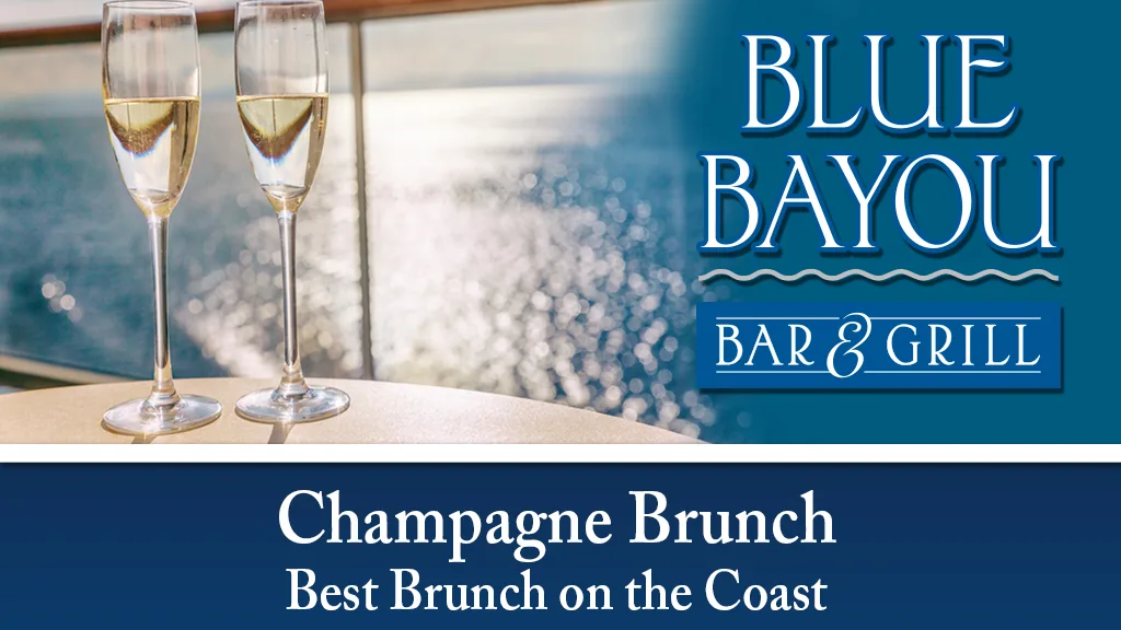 Blue Bayou champagne brunch with two glasses overlooking the Gulf Coast