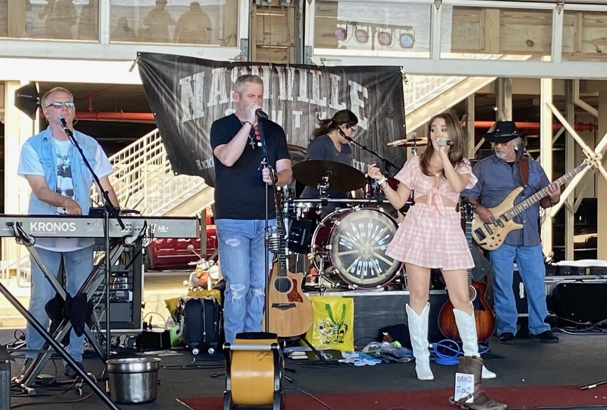 Live band performing for a crowd at the Silver Slipper Stage Bar